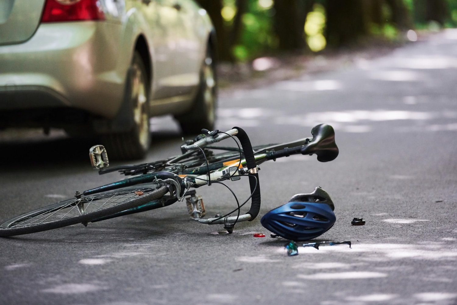 Bicycle tipped over on side of road