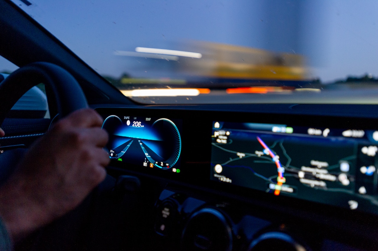 A driver focused on the road, with a dashboard display highlighting the dangers of reckless driving in Rancho Cucamonga.