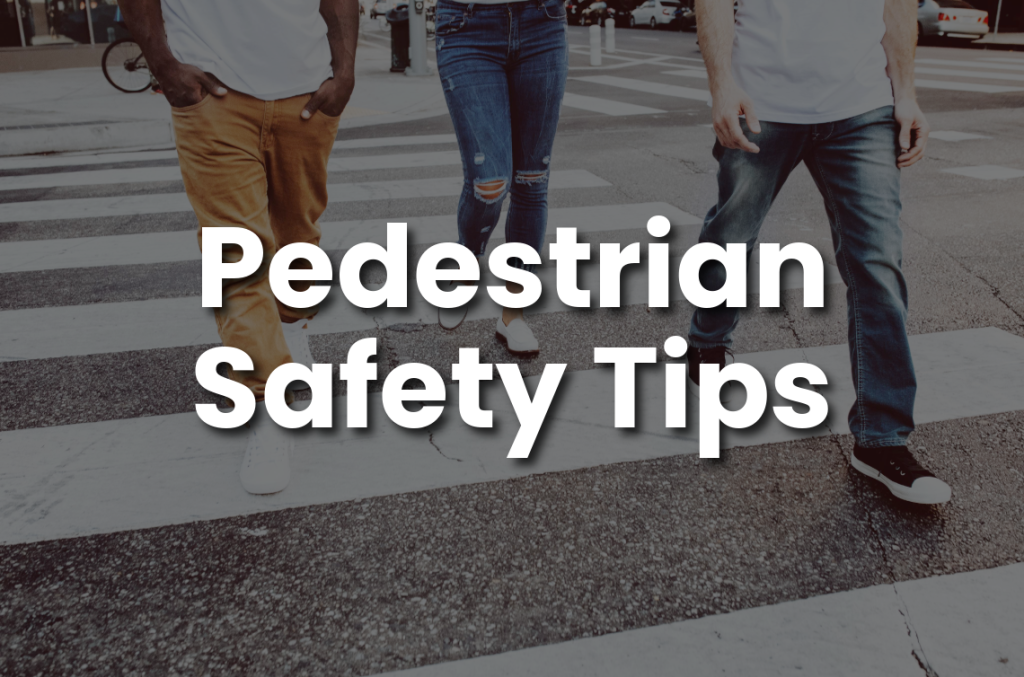 People crossing a city crosswalk, illustrating pedestrian safety tips and how to avoid pedestrian accidents.