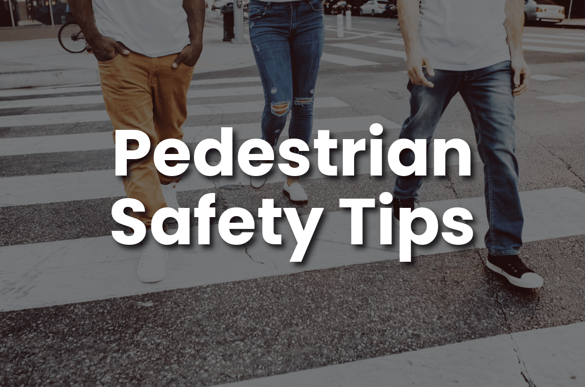 People crossing a city crosswalk, illustrating pedestrian safety tips and how to avoid pedestrian accidents.