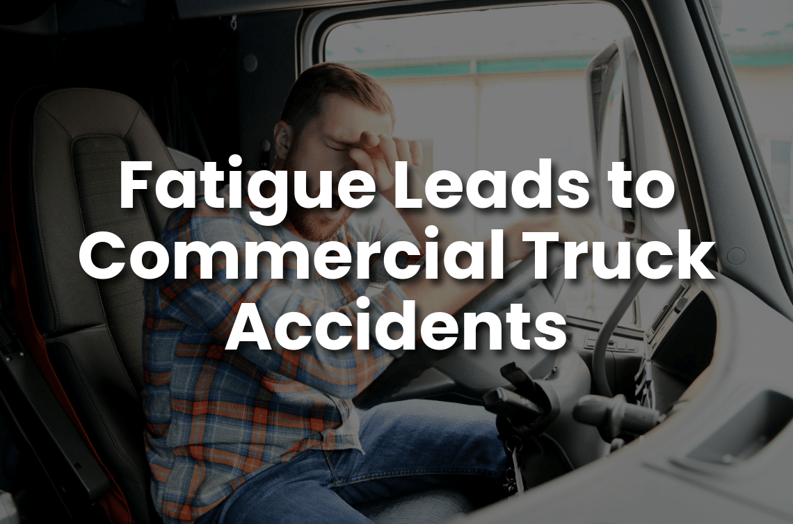Tired commercial truck driver rubbing his eyes from fatigue while sitting behind the wheel, illustrating how fatigue can lead to serious commercial truck accidents in California