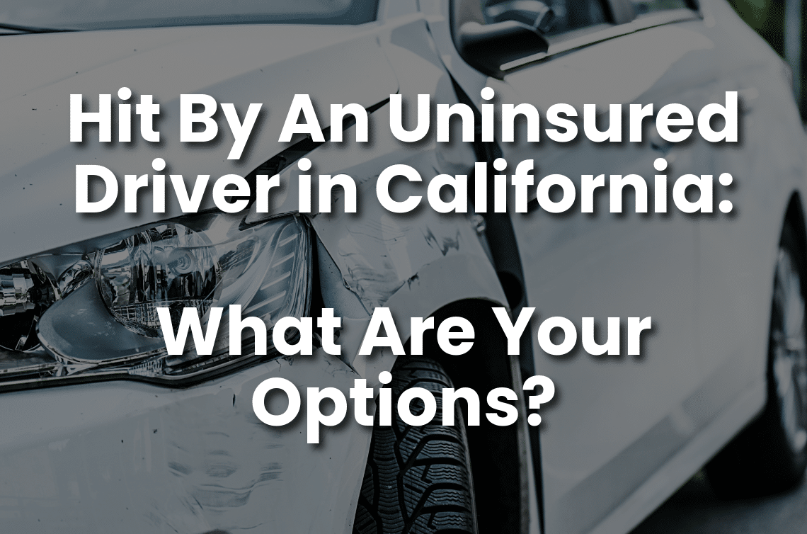 Damaged white car after an accident with the text “Hit By An Uninsured Driver in California: What Are Your Options?” for uninsured driver accident claims in California.